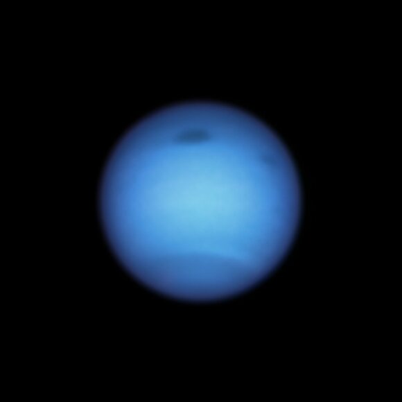 Neptune.  Photo by NASA / ESA / Hubble / New Horizons